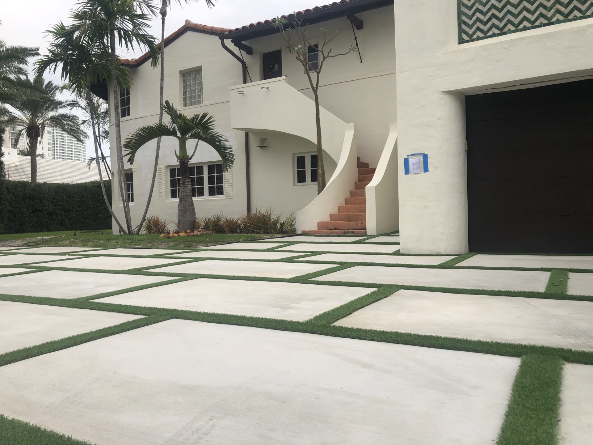 New concrete and paver driveway